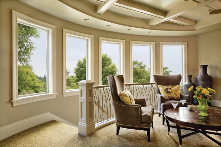 Curved wall of picture windows in a living room